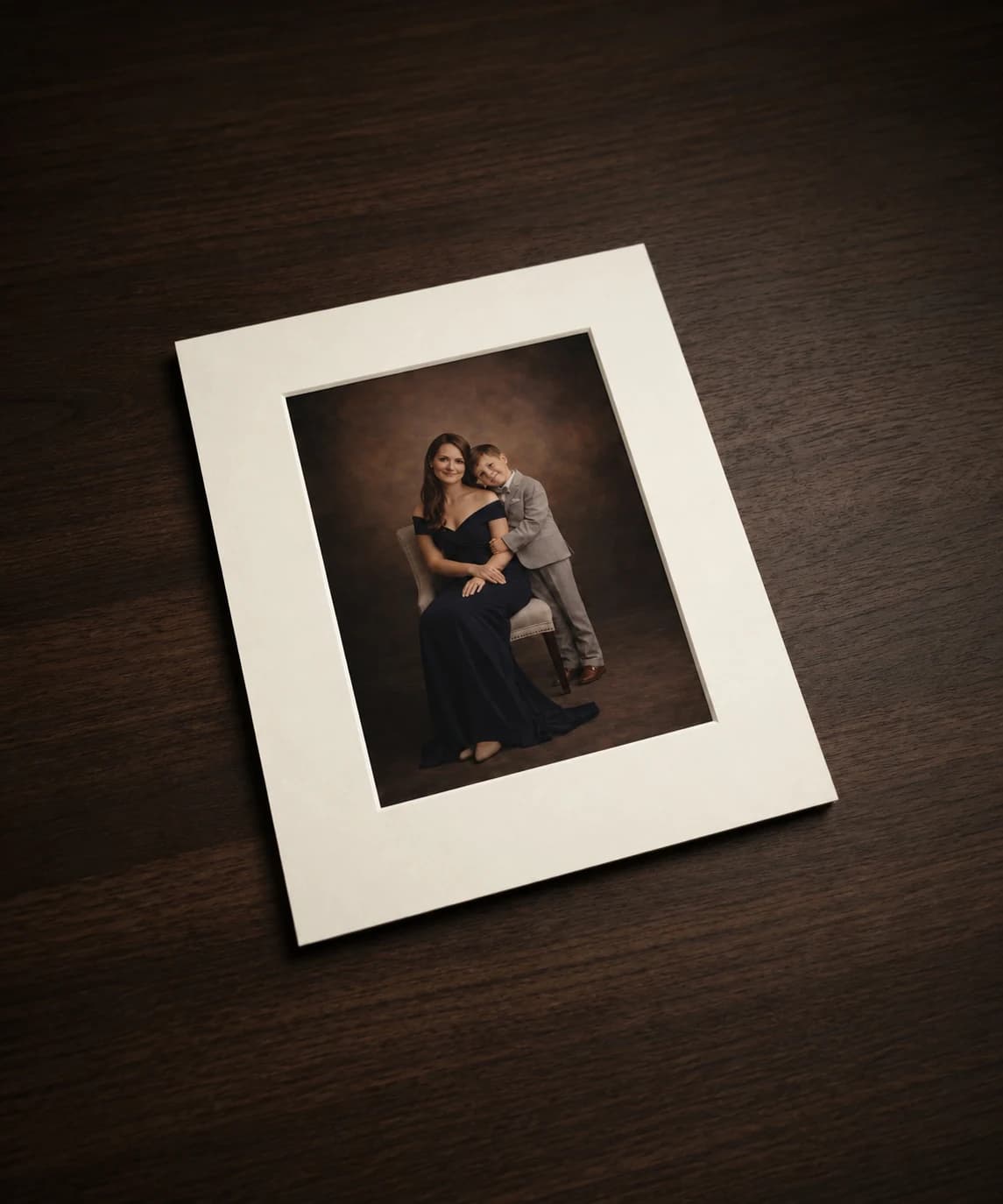 Illustrative matted portrait of a mother and son
