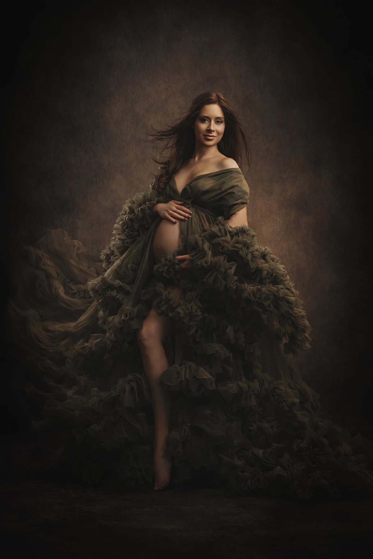 Maternity portrait in an olive ruffled gown